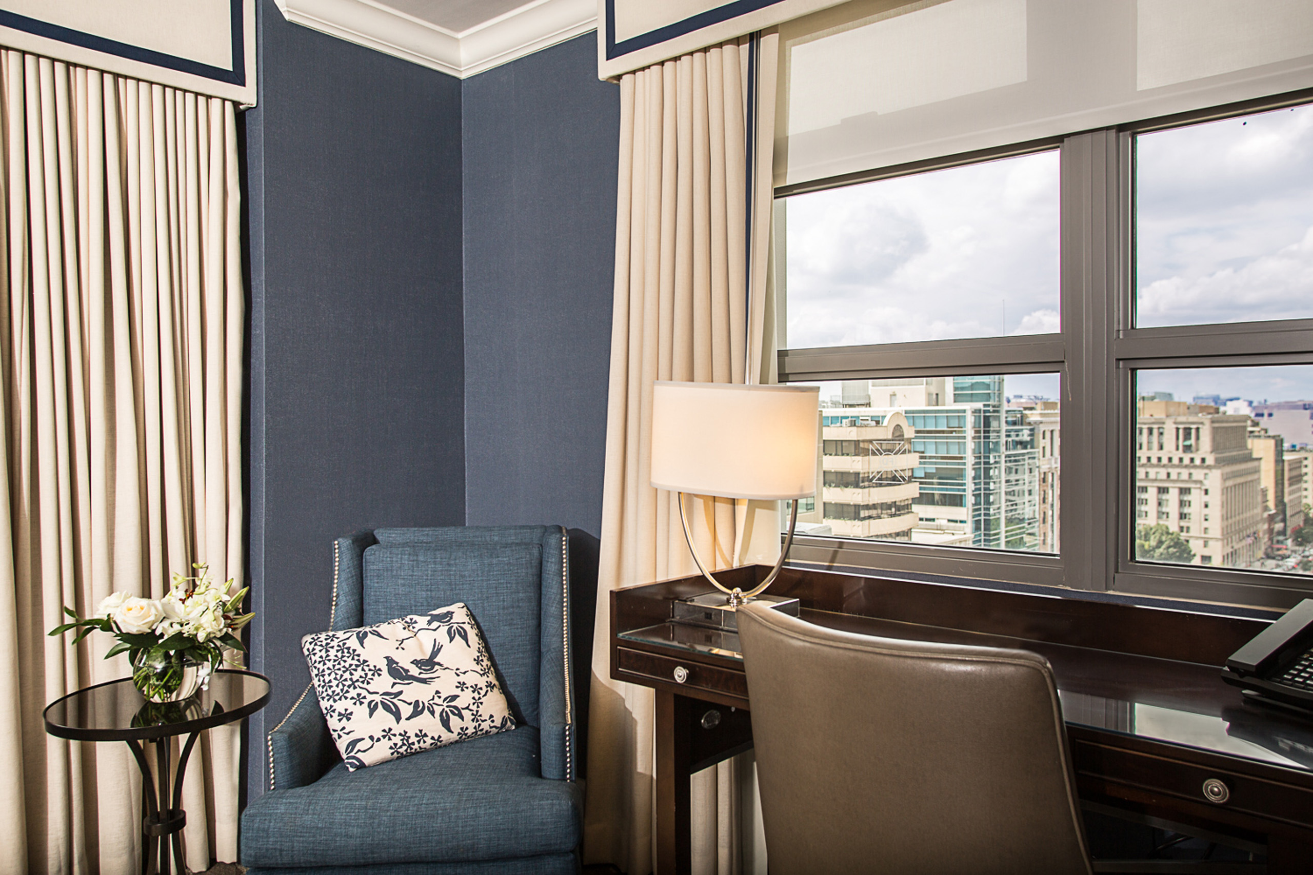Guest room workspace and seating area at Hamilton Hotel DC near downtown Washington DC