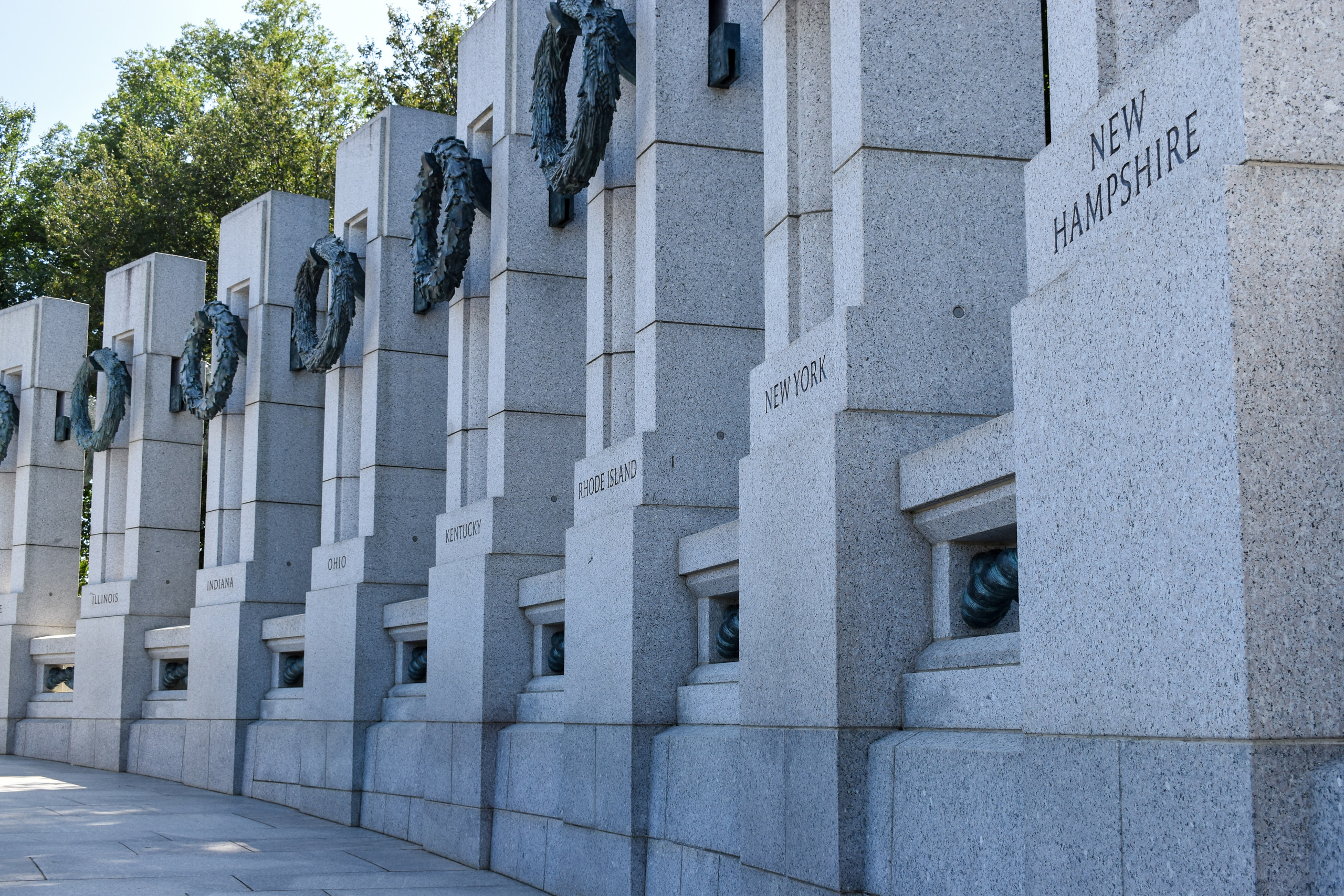World War II Memorial pillars with state names.