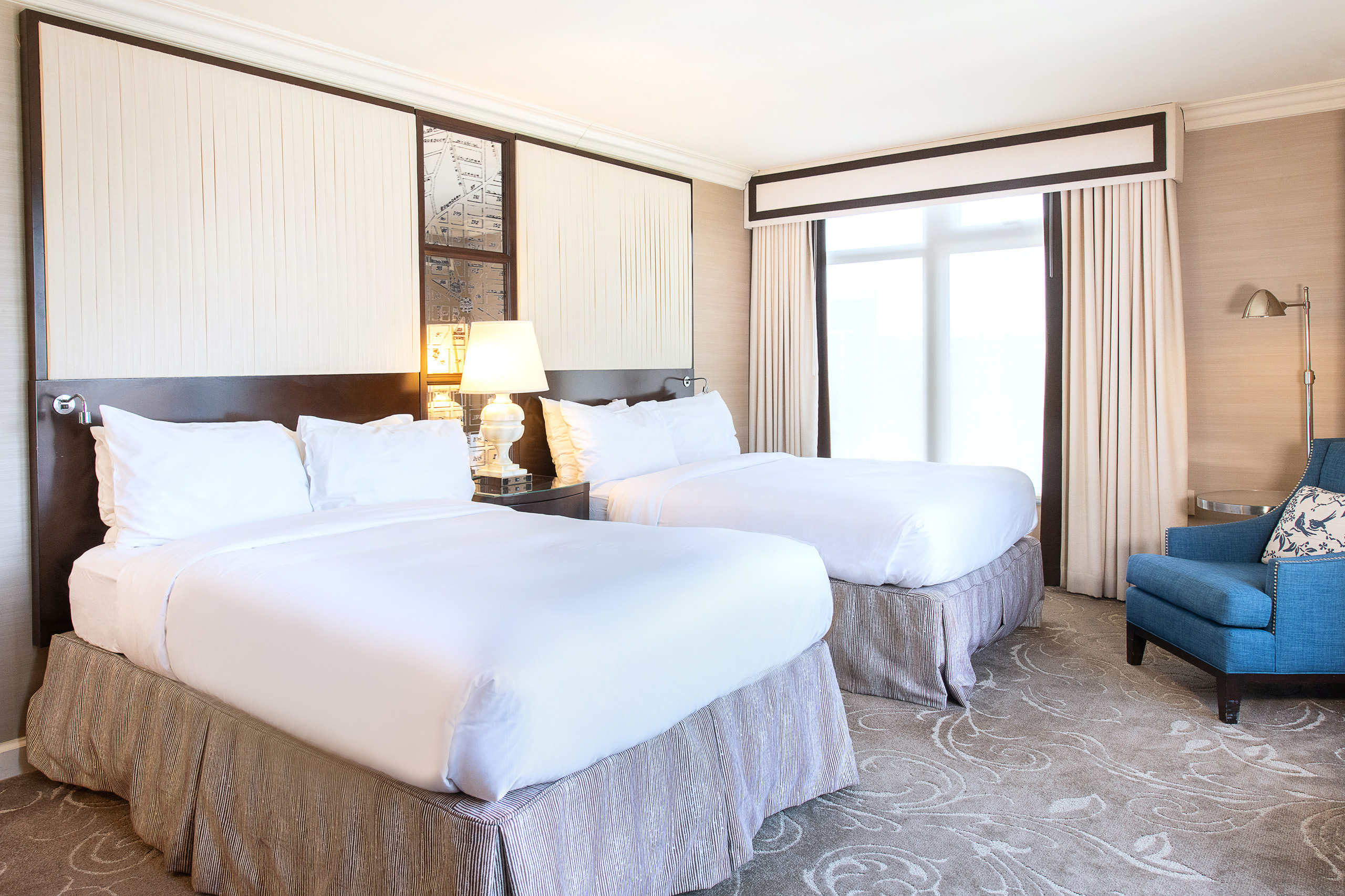 Double queen hotel room with city view