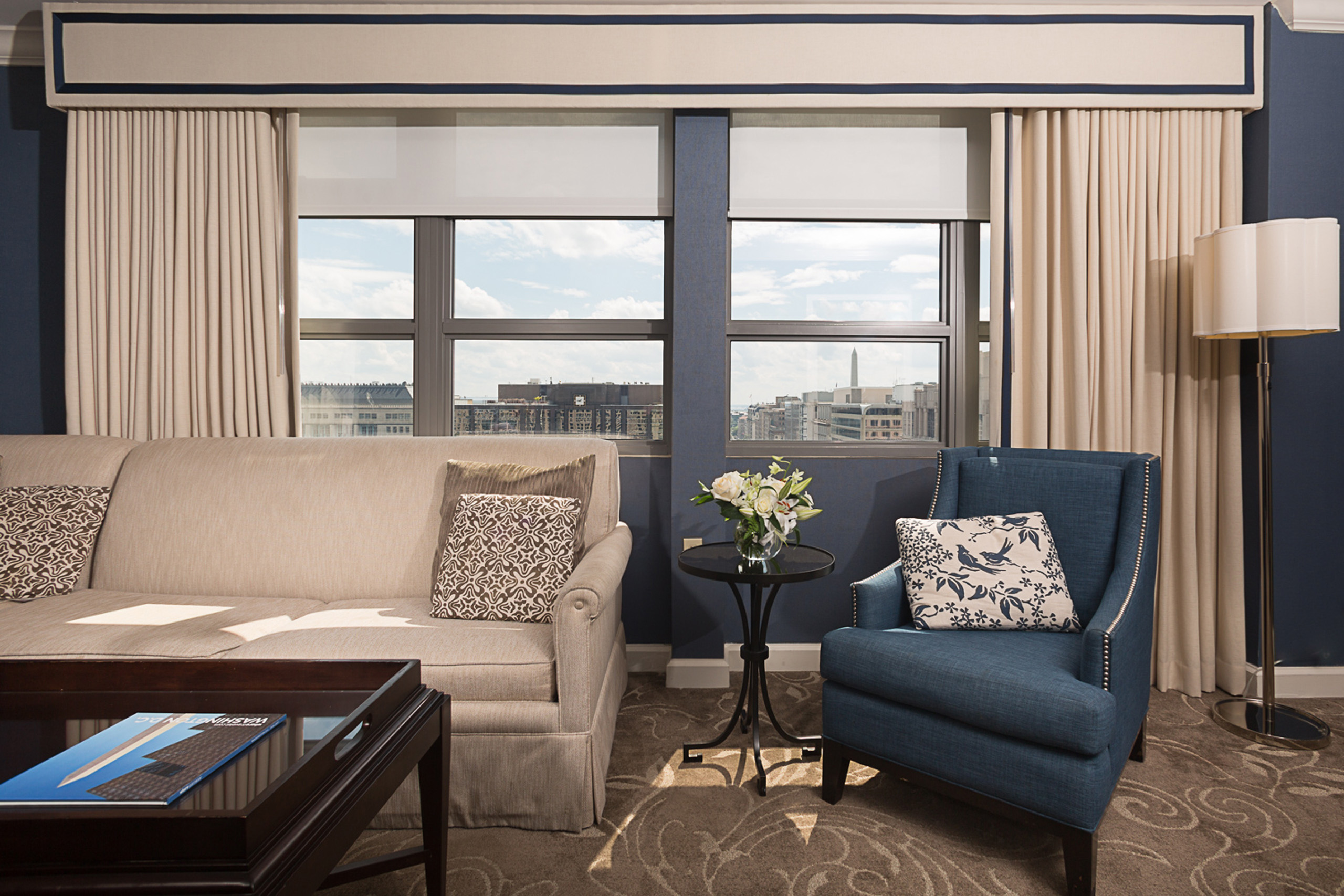 Hotel suite living room with skyline view