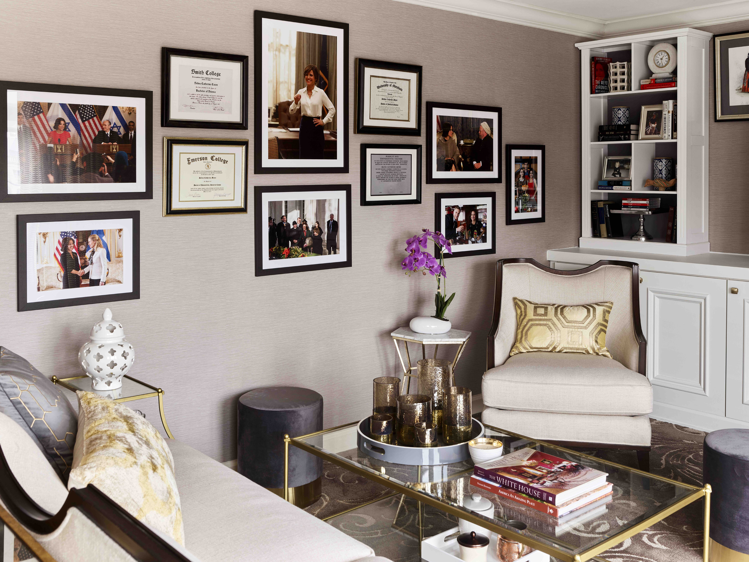 Elegant sitting area with framed photos.