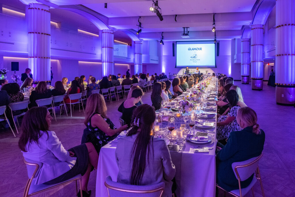 Panel discussion during seated banquet event.